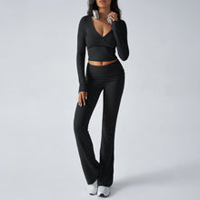 Women's fitted knit wrap top and flare pants set in black