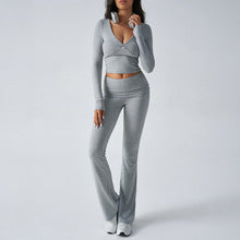 Women's fitted knit wrap top and flare pants set in gray