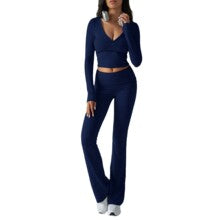 Women's fitted knit wrap top and flare pants set in navy