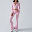 Women's fitted knit wrap top and flare pants set in pink